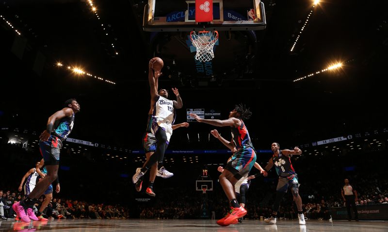 BROOKLYN, NY - APRIL 7: Davion Mitchell #15 of the Sacramento Kings drives to the basket during the game against the Brooklyn Nets on April 7, 2024 at Barclays Center in Brooklyn, New York. NOTE TO USER: User expressly acknowledges and agrees that, by downloading and or using this Photograph, user is consenting to the terms and conditions of the Getty Images License Agreement. Mandatory Copyright Notice: Copyright 2024 NBAE (Photo by Nathaniel S. Butler/NBAE via Getty Images)