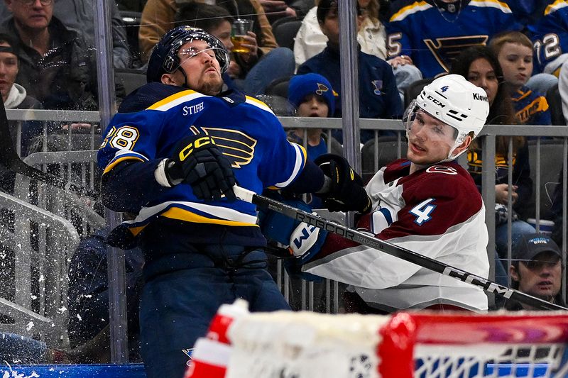 Dec 29, 2023; St. Louis, Missouri, USA;  Colorado Avalanche defenseman Bowen Byram (4) checks St. Louis Blues left wing Mackenzie MacEachern (28) during the second period at Enterprise Center. Mandatory Credit: Jeff Curry-USA TODAY Sports