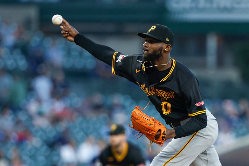 Sep 4, 2024; Chicago, Illinois, USA; Pittsburgh Pirates starting pitcher Domingo Germán (0) delivers a pitch against the Chicago Cubs during the first inning at Wrigley Field. Mandatory Credit: Kamil Krzaczynski-Imagn Images