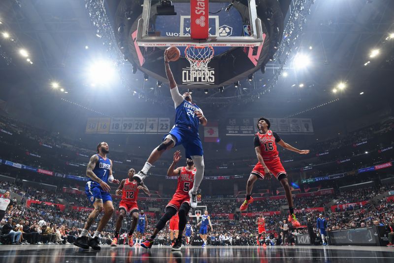 LOS ANGELES, CA - MARCH 9: Norman Powell #24 of the LA Clippers shoots the ball during the game against the Chicago Bulls on March 9, 2024 at Crypto.Com Arena in Los Angeles, California. NOTE TO USER: User expressly acknowledges and agrees that, by downloading and/or using this Photograph, user is consenting to the terms and conditions of the Getty Images License Agreement. Mandatory Copyright Notice: Copyright 2024 NBAE (Photo by Adam Pantozzi/NBAE via Getty Images)