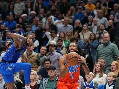 DALLAS, TX - DECEMBER 2: Isaiah Joe #11 of the Oklahoma City Thunder shoots a three point basket during the game on December 2, 2023 at the American Airlines Center in Dallas, Texas. NOTE TO USER: User expressly acknowledges and agrees that, by downloading and or using this photograph, User is consenting to the terms and conditions of the Getty Images License Agreement. Mandatory Copyright Notice: Copyright 2023 NBAE (Photo by Glenn James/NBAE via Getty Images)