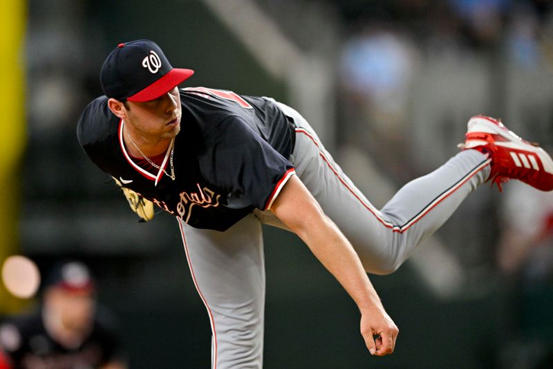 May 2, 2024; Arlington, Texas, USA; Washington Nationals starting pitcher Mitchell Parker (70) pithes against the Texas Rangers during the fourth inning at Globe Life Field. Mandatory Credit: Jerome Miron-USA TODAY Sports