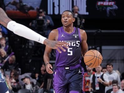 SACRAMENTO, CA - DECEMBER 23: De'Aaron Fox #5 of the Sacramento Kings brings the ball up court against the Minnesota Timberwolves on December 23, 2023 at Golden 1 Center in Sacramento, California. NOTE TO USER: User expressly acknowledges and agrees that, by downloading and or using this Photograph, user is consenting to the terms and conditions of the Getty Images License Agreement. Mandatory Copyright Notice: Copyright 2023 NBAE (Photo by Rocky Widner/NBAE via Getty Images)