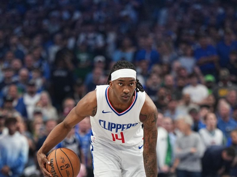 DALLAS, TX - APRIL 28: Terance Mann #14 of the LA Clippers handles the ball during the game against the Dallas Mavericks during Round 1 Game 4 of the 2024 NBA Playoffs on April 28, 2024 at the American Airlines Center in Dallas, Texas. NOTE TO USER: User expressly acknowledges and agrees that, by downloading and or using this photograph, User is consenting to the terms and conditions of the Getty Images License Agreement. Mandatory Copyright Notice: Copyright 2024 NBAE (Photo by Glenn James/NBAE via Getty Images)