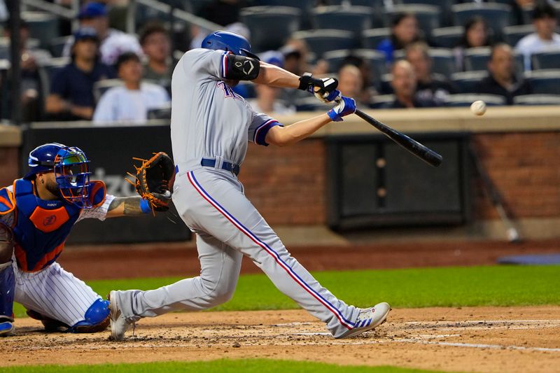 Aug 30, 2023; New York City, New York, USA;  Texas Rangers shortstop Corey Seager (5) hits a home run against the New York Mets during the fourth inning at Citi Field. Mandatory Credit: Gregory Fisher-USA TODAY Sports