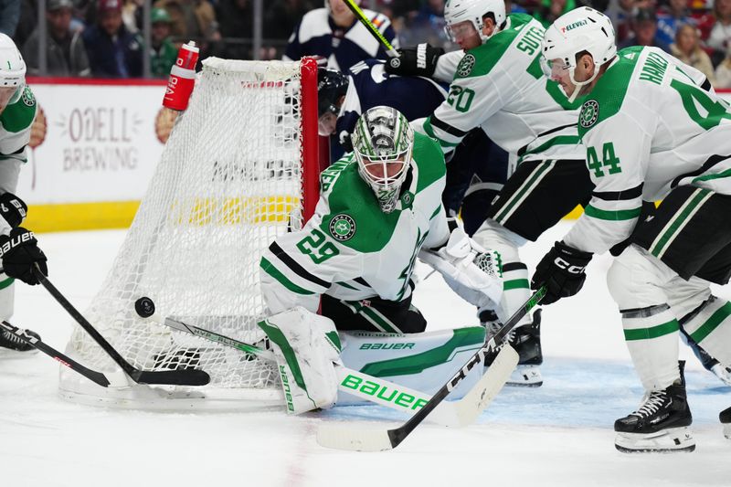 Feb 27, 2024; Denver, Colorado, USA; Dallas Stars goaltender Jake Oettinger (29) and defenseman Joel Hanley (44) during the second period against the Colorado Avalanche at Ball Arena. Mandatory Credit: Ron Chenoy-USA TODAY Sports