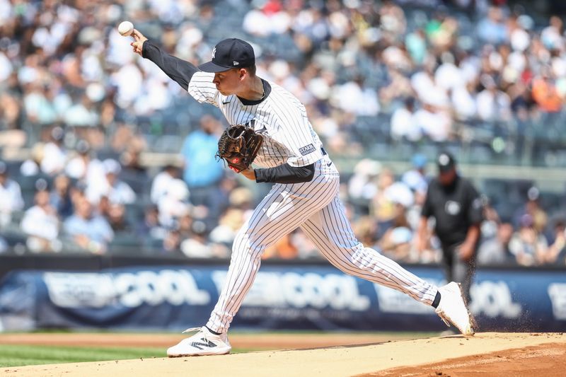 Aug 24, 2024; Bronx, New York, USA;  New York Yankees starting pitcher Will Warren (98) pitches in the first inning against the Colorado Rockies at Yankee Stadium. Mandatory Credit: Wendell Cruz-USA TODAY Sports