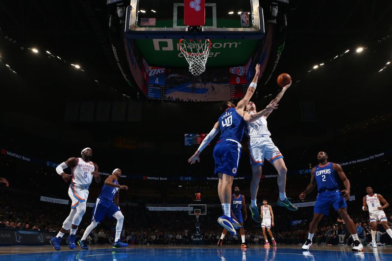 OKLAHOMA CITY, OK - FEBRUARY 22: Josh Giddey #3 of the Oklahoma City Thunder drives to the basket during the game against the LA Clippers on February 22SF, 2024 at Paycom Arena in Oklahoma City, Oklahoma. NOTE TO USER: User expressly acknowledges and agrees that, by downloading and or using this photograph, User is consenting to the terms and conditions of the Getty Images License Agreement. Mandatory Copyright Notice: Copyright 2024 NBAE (Photo by Zach Beeker/NBAE via Getty Images)