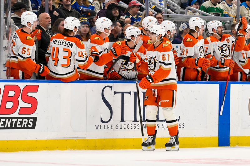 Mar 16, 2025; St. Louis, Missouri, USA;  Anaheim Ducks left wing Cutter Gauthier (61) is  congratulated by teammates after scoring against the St. Louis Blues during the second period at Enterprise Center. Mandatory Credit: Jeff Curry-Imagn Images