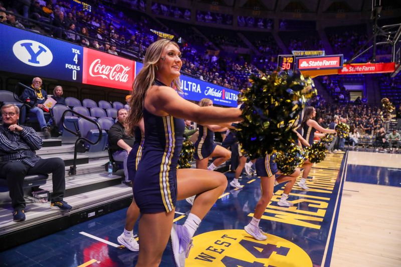 Feb 11, 2025; Morgantown, West Virginia, USA; A West Virginia Mountaineers dancer performs prior to their game against the Brigham Young Cougars at WVU Coliseum. Mandatory Credit: Ben Queen-Imagn Images