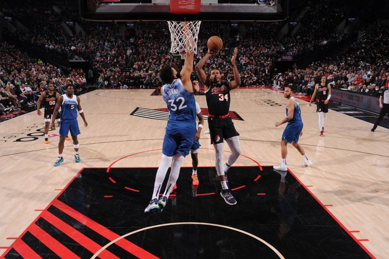 PORTLAND, OR - FEBRUARY 15: Jabari Walker #34 of the Portland Trail Blazers shoots the ball during the game against the Minnesota Timberwolves on February 15, 2024 at the Moda Center Arena in Portland, Oregon. NOTE TO USER: User expressly acknowledges and agrees that, by downloading and or using this photograph, user is consenting to the terms and conditions of the Getty Images License Agreement. Mandatory Copyright Notice: Copyright 2024 NBAE (Photo by Cameron Browne/NBAE via Getty Images)