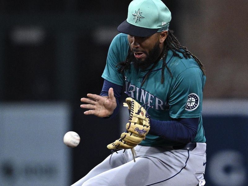 Mar 25, 2024; San Diego, California, USA; Seattle Mariners shortstop J.P. Crawford (3) fields a ground ball during the second inning against the San Diego Padres at Petco Park. Mandatory Credit: Orlando Ramirez-USA TODAY Sports