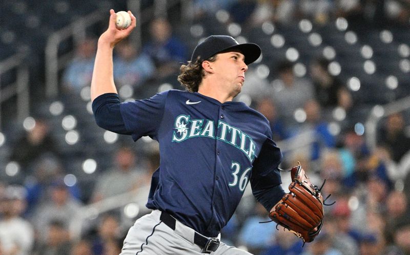 Apr 10, 2024; Toronto, Ontario, CAN;  Seattle Mariners starting pitcher Logan Gilbert (36) delivers a pitch against the Toronto Blue Jays in the second inning at Rogers Centre. Mandatory Credit: Dan Hamilton-USA TODAY Sports