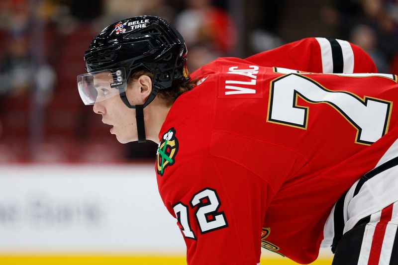 Oct 26, 2025; Chicago, Illinois, USA; Chicago Blackhawks defenseman Alex Vlasic (72) looks on during the first period at United Center. Mandatory Credit: Kamil Krzaczynski-Imagn Images
