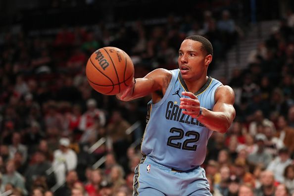 PORTLAND, OREGON - NOVEMBER 05: Desmond Bane #22 of the Memphis Grizzlies passes the ball during the fourth quarter against the Portland Trail Blazers at Moda Center on November 05, 2023 in Portland, Oregon. NOTE TO USER: User expressly acknowledges and agrees that, by downloading and or using this photograph, User is consenting to the terms and conditions of the Getty Images License Agreement.? (Photo by Amanda Loman/Getty Images)