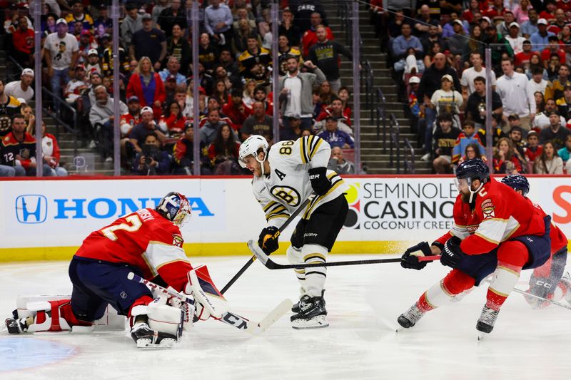 May 6, 2024; Sunrise, Florida, USA; Boston Bruins right wing David Pastrnak (88) shoots the puck but cannot score against Florida Panthers goaltender Sergei Bobrovsky (72) during the third period in game one of the second round of the 2024 Stanley Cup Playoffs at Amerant Bank Arena. Mandatory Credit: Sam Navarro-USA TODAY Sports