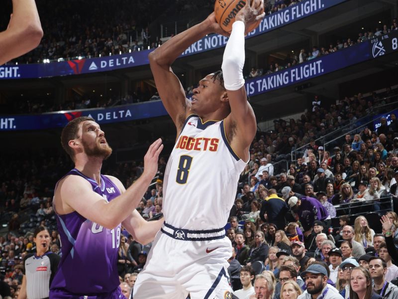 SALT LAKE CITY, UT - WEDNESDAY 27: Peyton Watson #8 of the Denver Nuggets looks to pass the ball during the game against the Utah Jazz on Wednesday 27, 2024 at vivint.SmartHome Arena in Salt Lake City, Utah. NOTE TO USER: User expressly acknowledges and agrees that, by downloading and or using this Photograph, User is consenting to the terms and conditions of the Getty Images License Agreement. Mandatory Copyright Notice: Copyright 2024 NBAE (Photo by Melissa Majchrzak/NBAE via Getty Images)