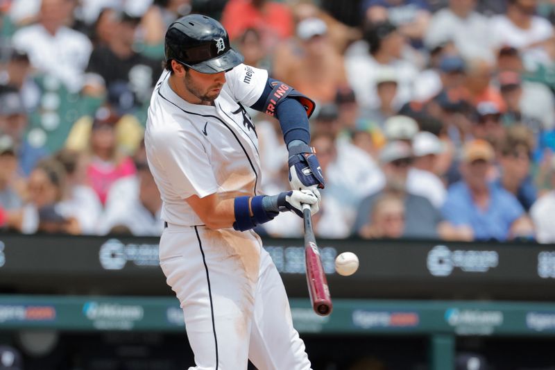 Jun 23, 2024; Detroit, Michigan, USA;  Detroit Tigers third baseman Matt Vierling (8) hits a single in the second inning against the Chicago White Sox at Comerica Park. Mandatory Credit: Rick Osentoski-USA TODAY Sports