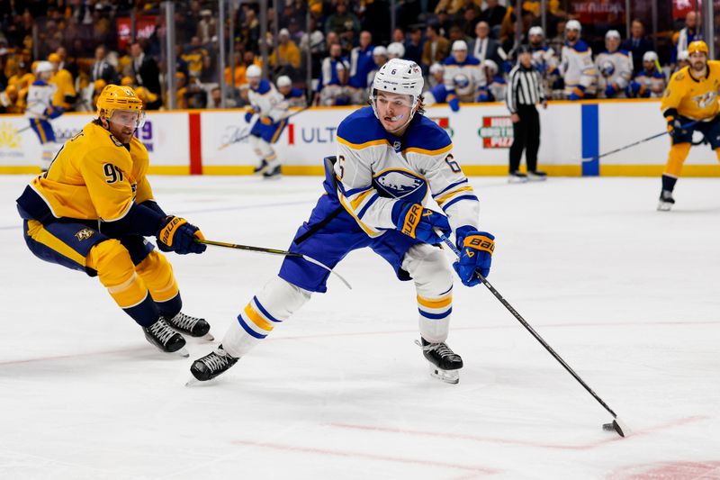 Jan 20, 2026; Nashville, Tennessee, USA;  Buffalo Sabres left wing Zach Benson (6) skates with the puck against the Nashville Predators during the second period at Bridgestone Arena. Mandatory Credit: Steve Roberts-Imagn Images