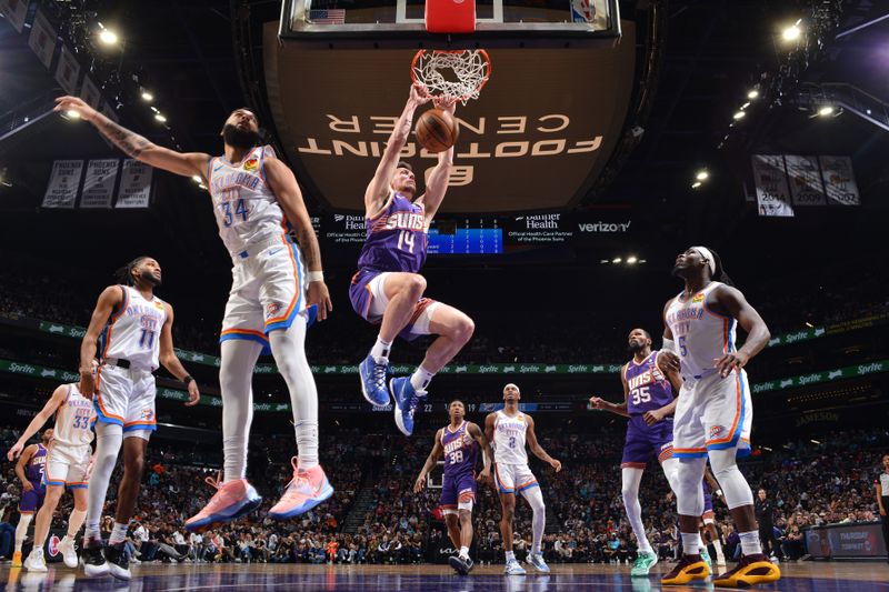 PHOENIX, AZ - MARCH 3: Drew Eubanks #14 of the Phoenix Suns dunks the ball during the game against the Oklahoma City Thunder on March 3, 2024 at Footprint Center in Phoenix, Arizona. NOTE TO USER: User expressly acknowledges and agrees that, by downloading and or using this photograph, user is consenting to the terms and conditions of the Getty Images License Agreement. Mandatory Copyright Notice: Copyright 2024 NBAE (Photo by Barry Gossage/NBAE via Getty Images)