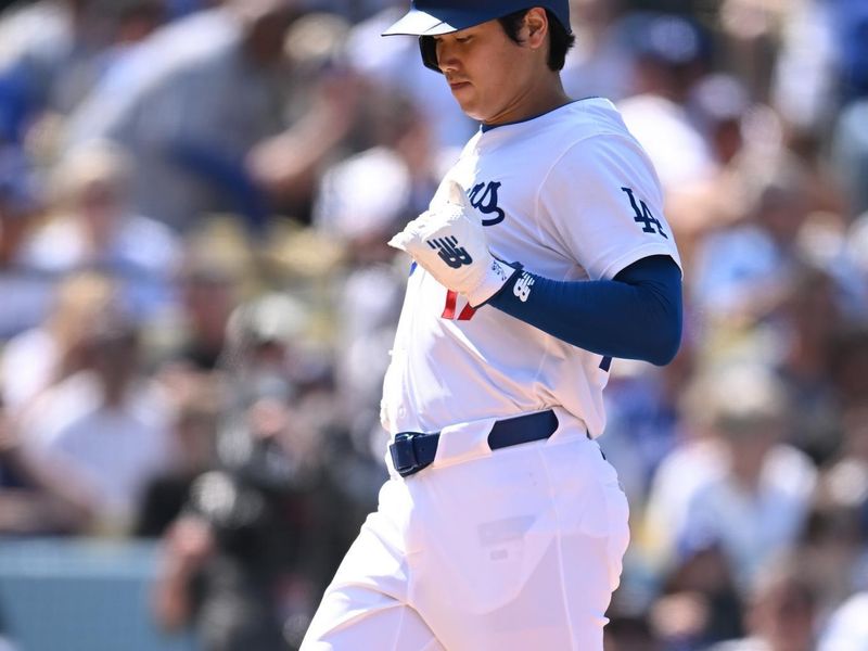 Apr 20, 2024; Los Angeles, California, USA; Los Angeles Dodgers designated hitter Shohei Ohtani (17) scores against the New York Mets during the fifth inning at Dodger Stadium. Mandatory Credit: Jonathan Hui-USA TODAY Sports