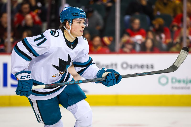 Nov 13, 2025; Calgary, Alberta, CAN; San Jose Sharks center Macklin Celebrini (71) skates against the Calgary Flames during the second period at Scotiabank Saddledome. Mandatory Credit: Sergei Belski-Imagn Images