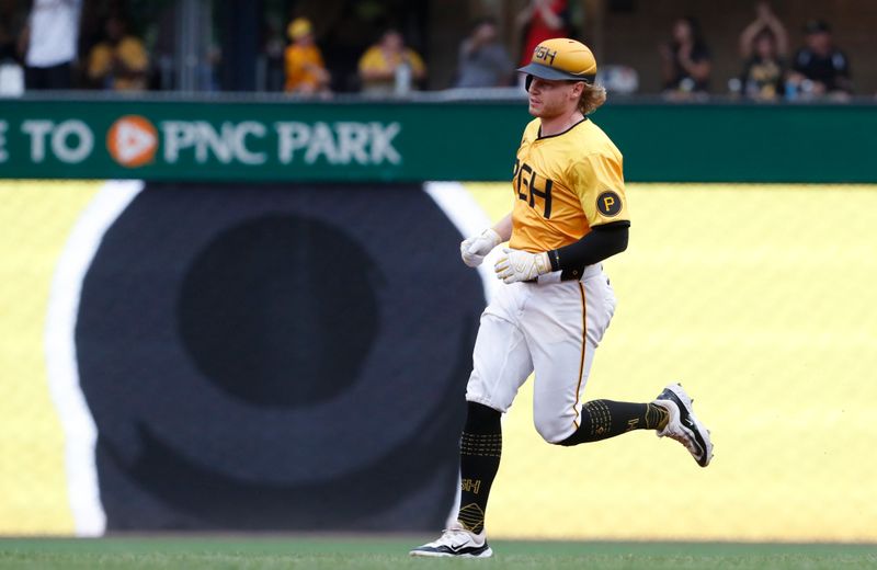 Jul 5, 2024; Pittsburgh, Pennsylvania, USA;  Pittsburgh Pirates left fielder Jack Suwinski (65) circles the bases on a solo home run against the New York Mets during the fourth inning at PNC Park. Mandatory Credit: Charles LeClaire-USA TODAY Sports