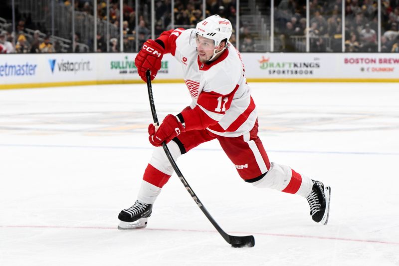 Dec 3, 2024; Boston, Massachusetts, USA; Detroit Red Wings right wing Vladimir Tarasenko (11) takes a shot against the Boston Bruins during the second period at the TD Garden. Mandatory Credit: Brian Fluharty-Imagn Images