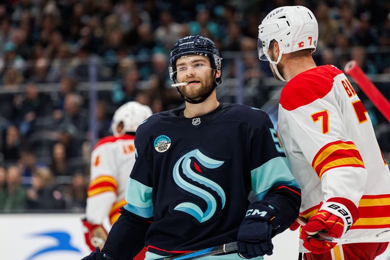 Oct 19, 2024; Seattle, Washington, USA; Seattle Kraken center Shane Wright (51) reacts against the Calgary Flames during the third period at Climate Pledge Arena. Mandatory Credit: Caean Couto-Imagn Images