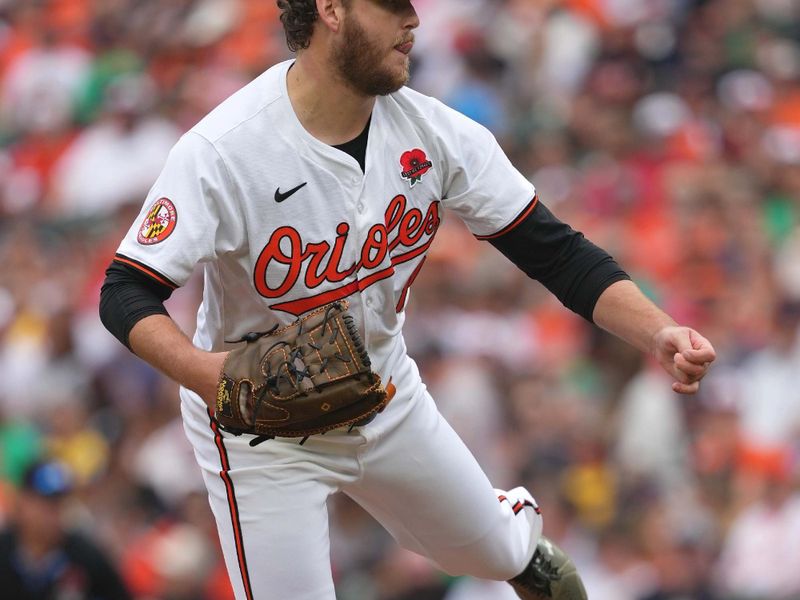 May 27, 2024; Baltimore, Maryland, USA; Baltimore Orioles starting pitcher Cole Irvin (19) delivers in the first inning against the Boston Red Sox at Oriole Park at Camden Yards. Mandatory Credit: Mitch Stringer-USA TODAY Sports