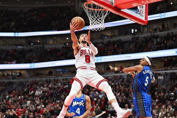 CHICAGO, ILLINOIS - NOVEMBER 15:  Zach Lavine #8 of the Chicago Bulls controls the ball against the Orlando Magic on November 15, 2023 at United Center in Chicago, Illinois.   NOTE TO USER: User expressly acknowledges and agrees that, by downloading and or using this photograph, User is consenting to the terms and conditions of the Getty Images License Agreement.  (Photo by Jamie Sabau/Getty Images)