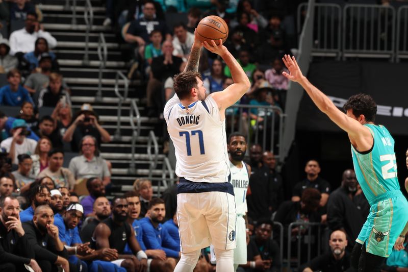 CHARLOTTE, NC - APRIL 9: Luka Doncic #77 of the Dallas Mavericks shoots the ball during the game against the Charlotte Hornets on April 9, 2024 at Spectrum Center in Charlotte, North Carolina. NOTE TO USER: User expressly acknowledges and agrees that, by downloading and or using this photograph, User is consenting to the terms and conditions of the Getty Images License Agreement. Mandatory Copyright Notice: Copyright 2024 NBAE (Photo by Kent Smith/NBAE via Getty Images)