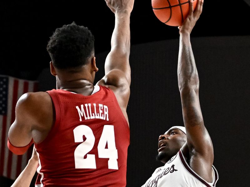 Mar 4, 2023; College Station, Texas, USA; Texas A&M Aggies guard Tyrece Radford (23) shots over Alabama Crimson Tide forward Brandon Miller (24) during the second half at Reed Arena. Mandatory Credit: Maria Lysaker-USA TODAY Sports