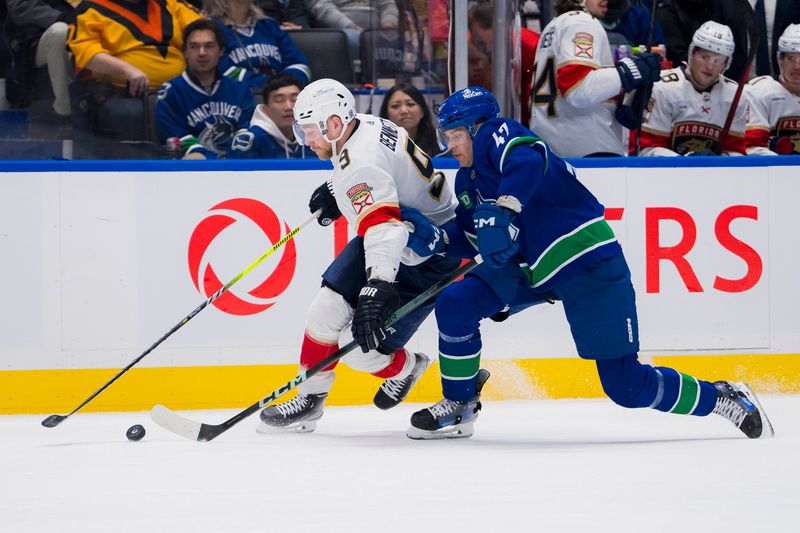 Dec 14, 2023; Vancouver, British Columbia, CAN; Florida Panthers forward Sam Bennett (9) drives past Vancouver Canucks defenseman Noah Juulsen (47) in the second period at Rogers Arena. Mandatory Credit: Bob Frid-USA TODAY Sports