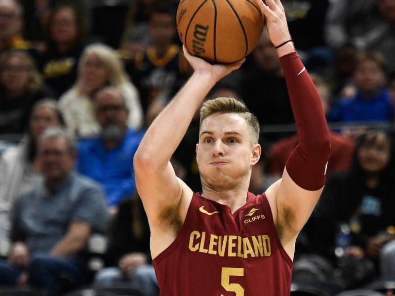 SALT LAKE CITY, UTAH - APRIL 02: Sam Merrill #5 of the Cleveland Cavaliers shoots during the second half of a game against the Utah Jazz at Delta Center on April 02, 2024 in Salt Lake City, Utah. NOTE TO USER: User expressly acknowledges and agrees that, by downloading and or using this photograph, User is consenting to the terms and conditions of the Getty Images License Agreement. (Photo by Alex Goodlett/Getty Images)