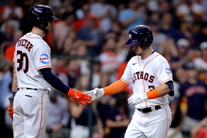 Sep 13, 2023; Houston, Texas, USA; Houston Astros third baseman Alex Bregman (2) is congratulated by Houston Astros right fielder Kyle Tucker (30) after after hitting a home run to left field against the Oakland Athletics during the third inning at Minute Maid Park. Mandatory Credit: Erik Williams-USA TODAY Sports