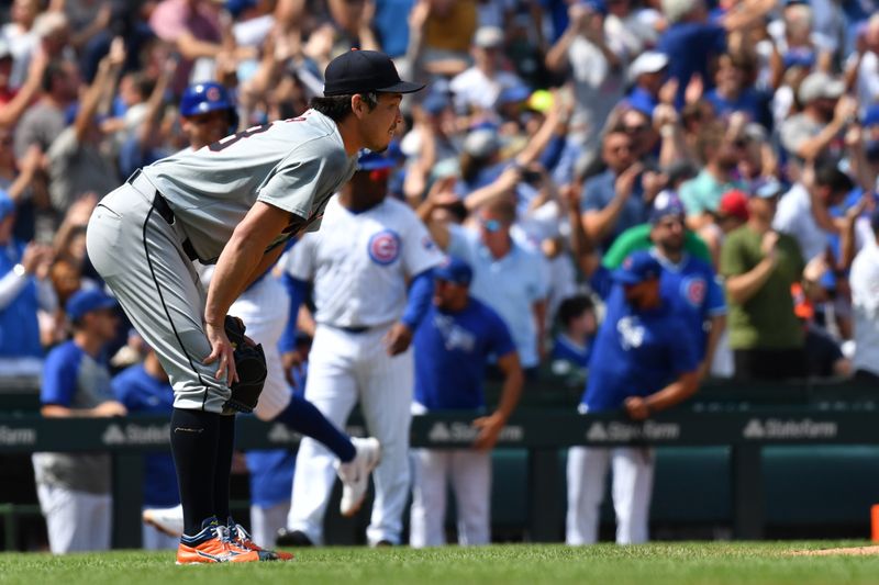 Aug 22, 2024; Chicago, Illinois, USA; Detroit Tigers relief pitcher Kenta Maeda (18) reacts after giving up a grand slam to Chicago Cubs catcher Miguel Amaya (not pictured) during the second inning at Wrigley Field. Mandatory Credit: Patrick Gorski-USA TODAY Sports