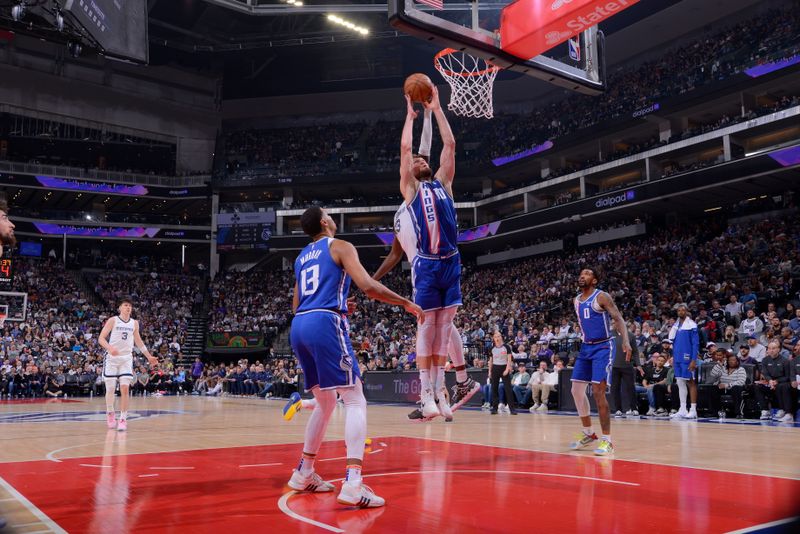 SACRAMENTO, CA - MARCH 18: Domantas Sabonis #10 of the Sacramento Kings goes up for the rebound during the game against the Memphis Grizzlies on March 18, 2024 at Golden 1 Center in Sacramento, California. NOTE TO USER: User expressly acknowledges and agrees that, by downloading and or using this Photograph, user is consenting to the terms and conditions of the Getty Images License Agreement. Mandatory Copyright Notice: Copyright 2024 NBAE (Photo by Rocky Widner/NBAE via Getty Images)