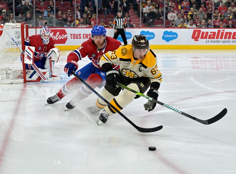 Mar 14, 2024; Montreal, Quebec, CAN; Boston Bruins forward Brad Marchand (63) plays the puck and Montreal Canadiens defenseman Mike Matheson (8) defends during the third period at the Bell Centre. Mandatory Credit: Eric Bolte-USA TODAY Sports