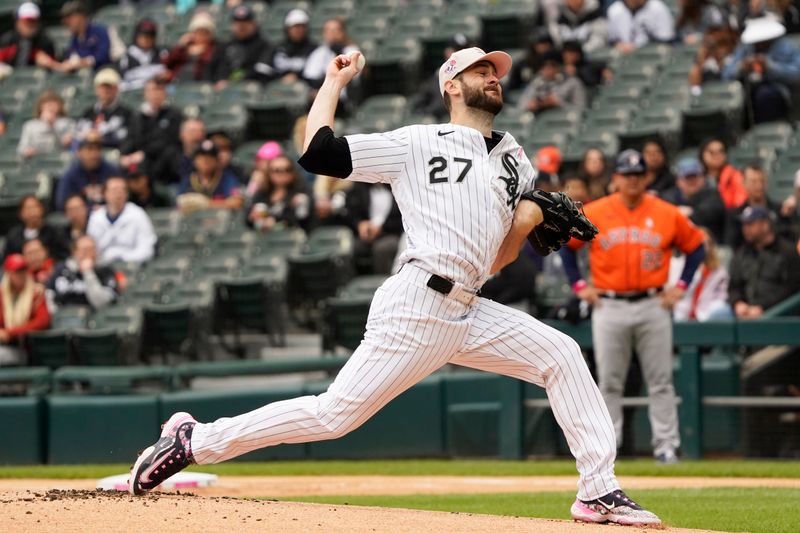 May 14, 2023; Chicago, Illinois, USA; Chicago White Sox starting pitcher Lucas Giolito (27) throws the ball against the Houston Astros during the first inning at Guaranteed Rate Field. Mandatory Credit: David Banks-USA TODAY Sports