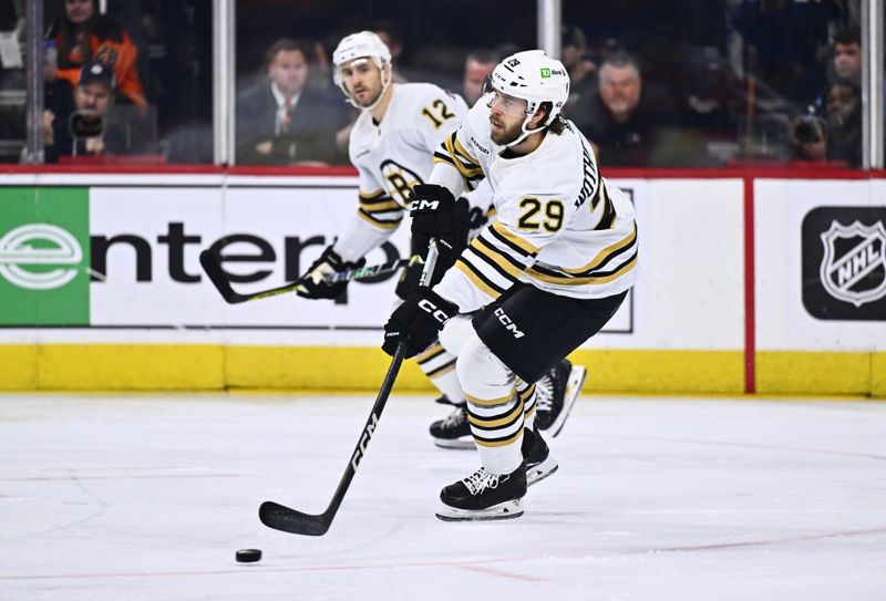 Jan 27, 2024; Philadelphia, Pennsylvania, USA; Boston Bruins defenseman Parker Wotherspoon (29) controls the puck against the Philadelphia Flyers in the second period at Wells Fargo Center. Mandatory Credit: Kyle Ross-USA TODAY Sports