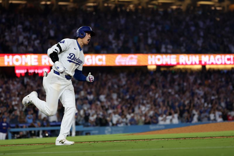 Jul 2, 2024; Los Angeles, California, USA;  Los Angeles Dodgers designated hitter Shohei Ohtani (17) reacts after hitting a two-run home run during the seventh inning against the Arizona Diamondbacks at Dodger Stadium. Mandatory Credit: Kiyoshi Mio-USA TODAY Sports