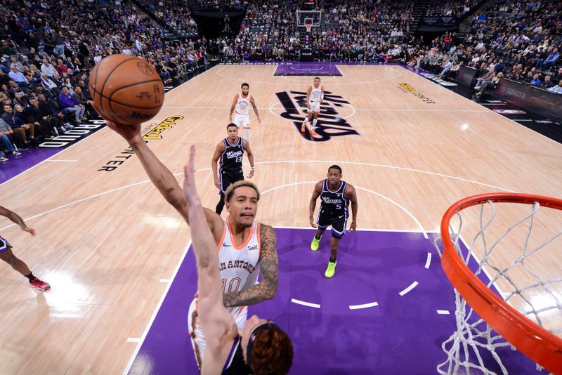 SACRAMENTO, CA - FEBRUARY 22: Jeremy Sochan #10 of the San Antonio Spurs drives to the basket during the game against the Sacramento Kings on February 22, 2024 at Golden 1 Center in Sacramento, California. NOTE TO USER: User expressly acknowledges and agrees that, by downloading and or using this Photograph, user is consenting to the terms and conditions of the Getty Images License Agreement. Mandatory Copyright Notice: Copyright 2023 NBAE (Photo by Rocky Widner/NBAE via Getty Images)