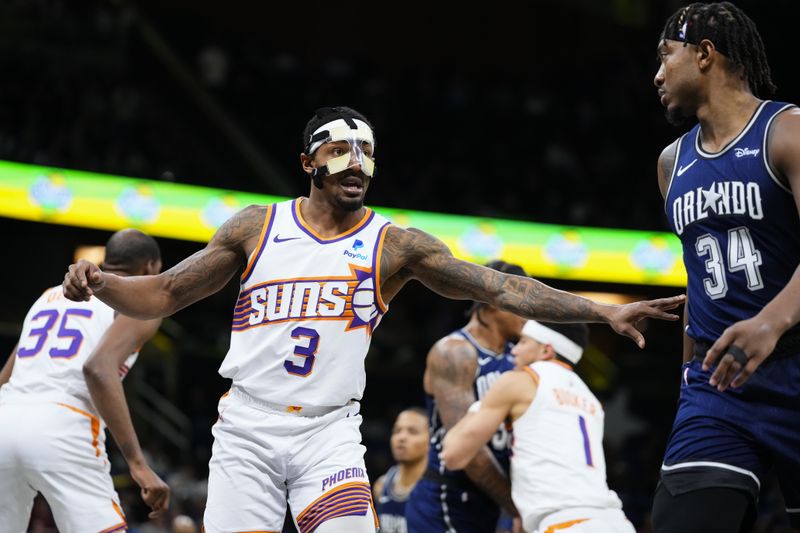 ORLANDO, FLORIDA - JANUARY 28: Bradley Beal #3 of the Phoenix Suns looks on against the Orlando Magic during the third quarter at Kia Center on January 28, 2024 in Orlando, Florida. NOTE TO USER: User expressly acknowledges and agrees that, by downloading and or using this photograph, User is consenting to the terms and conditions of the Getty Images License Agreement. (Photo by Rich Storry/Getty Images)