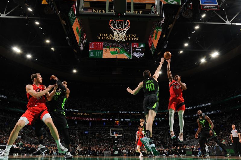 BOSTON, MA - NOVEMBER 16: Ochai Agbaji #30 of the Toronto Raptors  shoots the ball during the game against the Boston Celtics on November 16, 2024 at TD Garden in Boston, Massachusetts. NOTE TO USER: User expressly acknowledges and agrees that, by downloading and/or using this Photograph, user is consenting to the terms and conditions of the Getty Images License Agreement. Mandatory Copyright Notice: Copyright 2024 NBAE (Photo by Brian Babineau/NBAE via Getty Images)