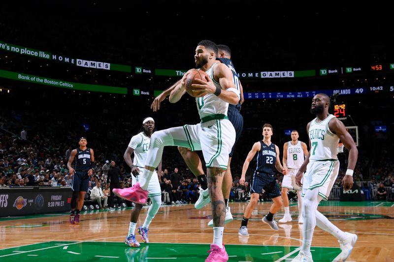 BOSTON, MA - APRIL 20: Jayson Tatum #0 of the Boston Celtics rebounds the ball during the game against the Orlando Magic during Round 1 Game 1 of the 2025 NBA Playoffs on April 20, 2025 at TD Garden in Boston, Massachusetts. NOTE TO USER: User expressly acknowledges and agrees that, by downloading and/or using this Photograph, user is consenting to the terms and conditions of the Getty Images License Agreement. Mandatory Copyright Notice: Copyright 2025 NBAE (Photo by Brian Babineau/NBAE via Getty Images)