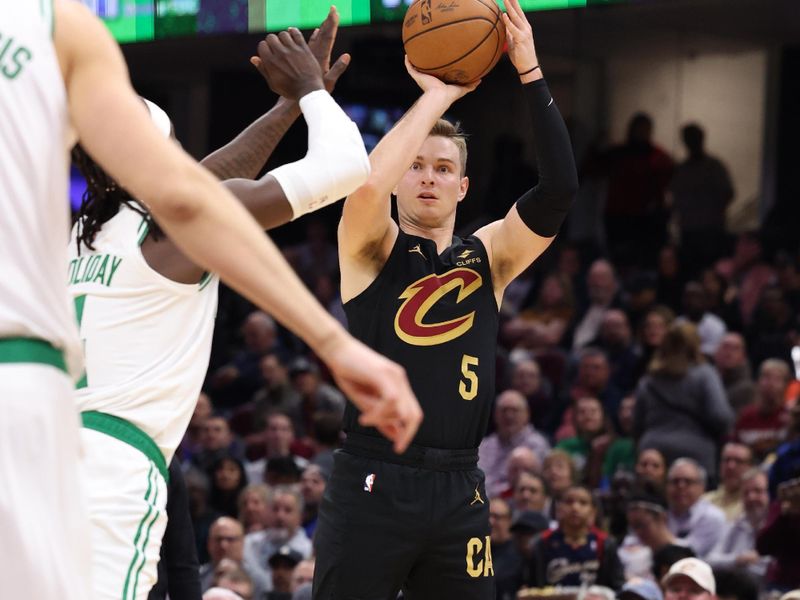 CLEVELAND, OH - MARCH 5: Sam Merrill #5 of the Cleveland Cavaliers shoots the ball during the game against the Boston Celtics on March 5, 2024 at Rocket Mortgage FieldHouse in Cleveland, Ohio. NOTE TO USER: User expressly acknowledges and agrees that, by downloading and/or using this Photograph, user is consenting to the terms and conditions of the Getty Images License Agreement. Mandatory Copyright Notice: Copyright 2024 NBAE (Photo by Lauren Leigh Bacho<p><br/></p>/NBAE via Getty Images)