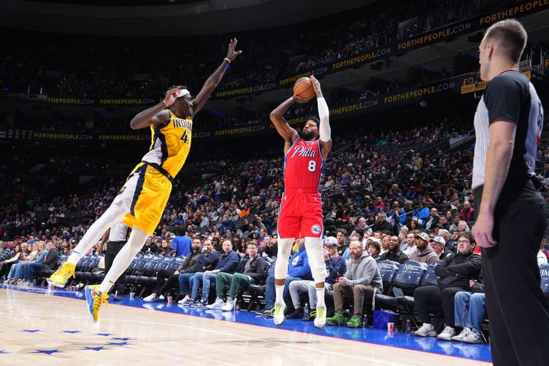 PHILADELPHIA, PA - DECEMBER 13: Paul George #8 of the Philadelphia 76ers shoots a three point basket during the game  against the Indiana Pacers on December 13, 2024 at the Wells Fargo Center in Philadelphia, Pennsylvania NOTE TO USER: User expressly acknowledges and agrees that, by downloading and/or using this Photograph, user is consenting to the terms and conditions of the Getty Images License Agreement. Mandatory Copyright Notice: Copyright 2024 NBAE (Photo by Jesse D. Garrabrant/NBAE via Getty Images)