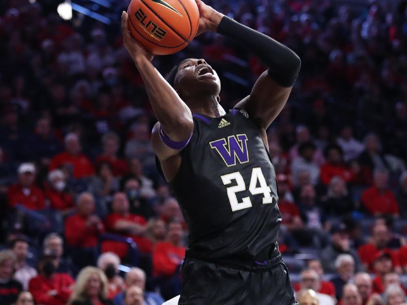 Jan 5, 2023; Tucson, Arizona, USA; Washington Huskies guard Noah Williams (24) makes a basket in the first half at McKale Center. Mandatory Credit: Zachary BonDurant-USA TODAY Sports