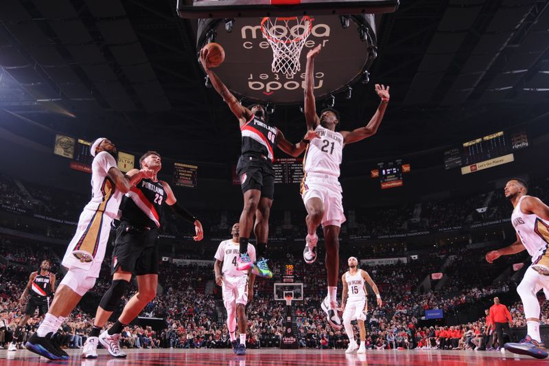 PORTLAND, OR - OCTOBER 25: Scoot Henderson #00 of the Portland Trail Blazers drives to the basket during the game against the New Orleans Pelicans on October 25, 2024 at the Moda Center Arena in Portland, Oregon. NOTE TO USER: User expressly acknowledges and agrees that, by downloading and or using this photograph, user is consenting to the terms and conditions of the Getty Images License Agreement. Mandatory Copyright Notice: Copyright 2024 NBAE (Photo by Cameron Browne/NBAE via Getty Images)